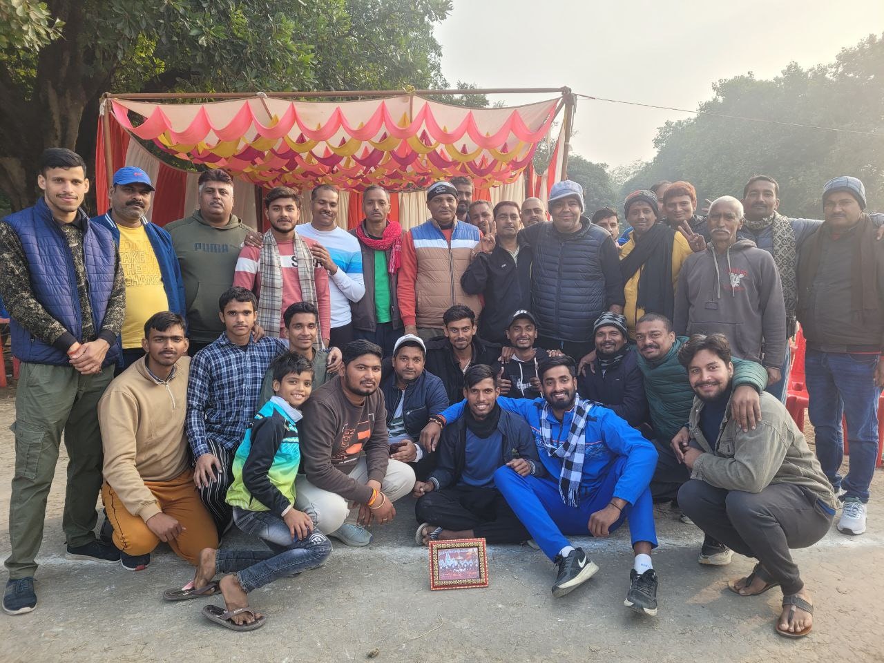 Bhandara — community gathering under decorated canopy